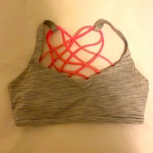 Lululemon Free to Be Bra in Grey/White and Pink.